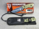 NIP Bushmaster Wilderness Conqueror fixed blade knife with sheath is model No 420HD. Measures approx