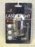 Laser sight includes 3 batteries, NIP.