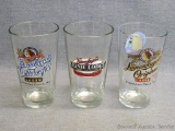 Three Leinenkugel's glasses including Oktoberfest Lager, Leinie Lodge, and Leinenkugel's Original