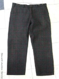 Pair of Codet wool pants were made in Canada and are in good condition. Inseam measures 30