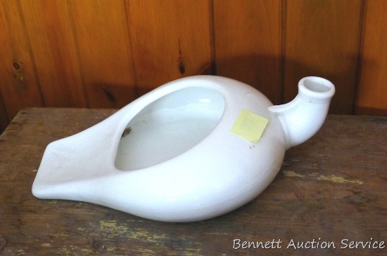 Porcelain bed pan is marked 'Warranted' and is in good condition with no chips or cracks noted.