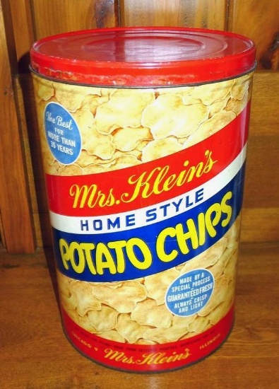 This 11-1/2" tall tin once held one pound of Mrs. Klein's Home Style Potato Chips. Nice colors and