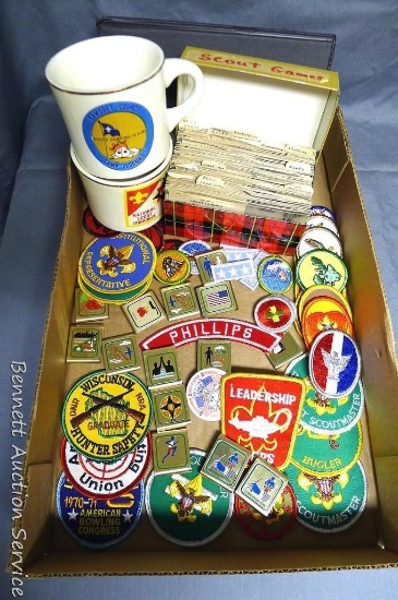 Boy Scout patches, metal merit badges, file of scout games, mug and more.