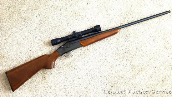 Savage Model 219L top break rifle in .30-30. Rifle has a unique side lever action and a tang safety.