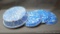 Blue and white enameled ware basin, plus three matching blue plates. Basin measures 12-3/4