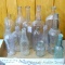 No Shipping. Collection of clear glass bottles including Towle Maple Products Co., Sand Rock Mineral