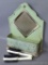 Enameled comb or brush wall mount caddy with mirror is about 11