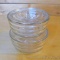 Two stacking refrigerator dishes are complete and in overall good condition with only a couple of