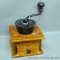 Neat old coffee grinder has box jointed corners. Stands nearly 8-1/2