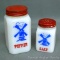 Vintage red, white and blue windmill pattern salt and pepper shakers are both in good condition.
