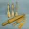 Three wooden kitchen mashers, plus two rolling pins. Largest rolling pin is one piece of wood and