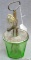 Green depression glass two cup beater jar has nifty pillar legs and is marked 'Vidrio Products Corp