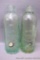 Two antique green glass bottles from 'Park Falls Bottling Works, Park Falls, Wis.'. Each bottle