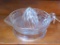 Clear glass juicer or reamer has a basket weave design and measures 8