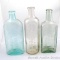 Three old medicine bottles. Dr. Pierce's Golden Medical Discovery, Dr. Peter Fahrney, and Lydia