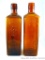 Two similar bitters bottles. One reads 'Rex Kidney and Liver Bitters, The Best Laxative and Blood