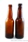 Dump dug cast glass beer bottles. Older is marked 'Hoster Col, O.' Newer is marked 'Hauck Cin, O.'