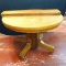 Delightful round oak pedestal table with three leaves. 45