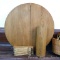 Solid wood round oak table is 3-1/2' across and already disassembled for easy transportation.