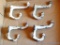 Four matching cast iron coat hooks, 3