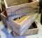 Remnants of fruit shipping crates. One from Otz Cranberry Company, the other from California. Up to