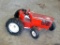 Cast metal tractor by Ertl is approx. 9