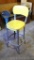 Retro kitchen stool has yellow vinyl upholstery, stands 24