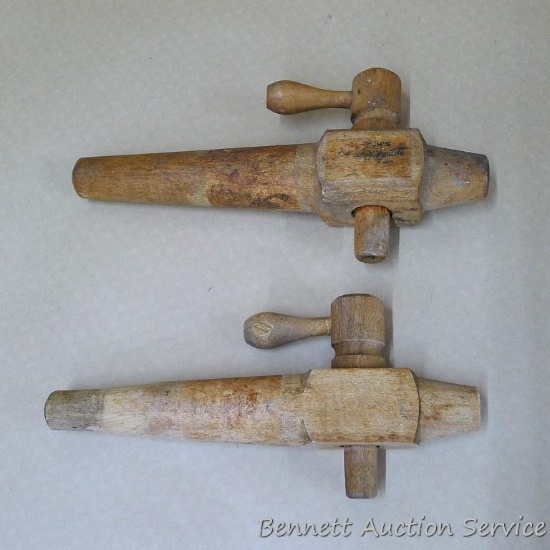 Two wooden barrel taps. Largest measures 9" x 4-1/2" x 1-1/2" and is stamped with a "3"; the other