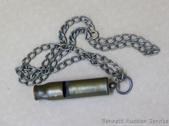 Boy Scouts of America brass whistle on a chain; whistle measures 2-1/2" x 1/2".