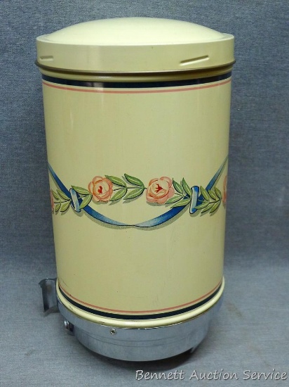 Coffee dispenser; includes wall mount (inside canister); measures 6" x 11" tall. Is in very good