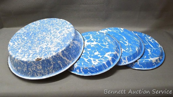 Blue and white enameled ware basin, plus three matching blue plates. Basin measures 12-3/4" across