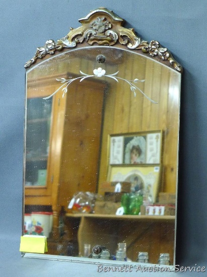 Vintage mirror with etching on the glass and beveled edges; measures 19" x 12".