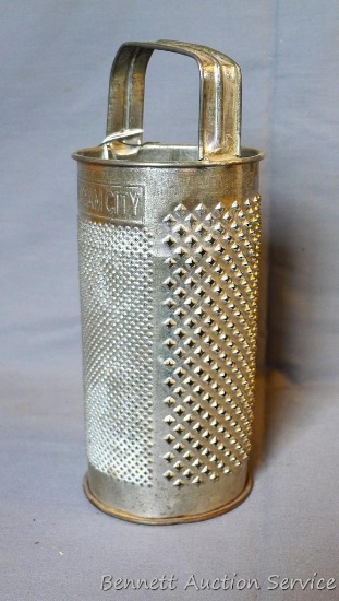Cream City grater has three option for coarseness, stands 10" tall.