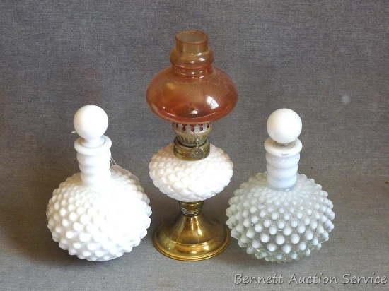 Two hobnail decanters, plus a little oil lamp. Decanters stand approx. 6" high.