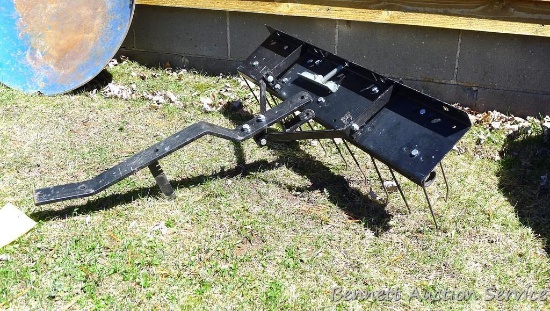 32" wide lawn dethatcher mounts on your riding mower