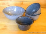 Four really cool graniteware enameled bowls ranging in size from 3-1/4
