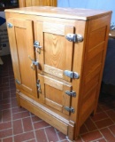 Nice smaller antique ice box has a galvanized lining, three doors with appropriate hardware and
