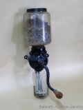 Arcade wall mountable coffee grinder is functional and is 15 inches tall. Juice glass catch cup,