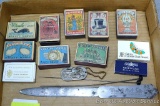 Vintage collection of empty match boxes; letter opener from The A. Axt Co., Diamond Importers,
