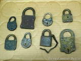 Interesting old padlocks; brands include Eagle, Napoleon, Invincible, Emu, and Orbin; largest lock