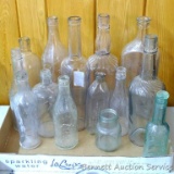 No Shipping. Collection of clear glass bottles including Towle Maple Products Co., Sand Rock Mineral