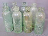 Eight heavy antique bottles all marked 'Park Falls Bottling Works, Park Falls, Wis.'. Each bottle