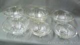 Six matching nesting glass serving or mixing bowls. Largest is 9-3/4