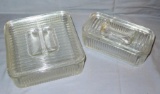 Two ribbed refrigerator dishes in overall good condition. Larger dish is an 8