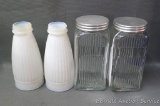 Two ribbed glass spice jars with aluminum lids; two white glass bottles, one is marked on bottom '8'