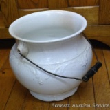Porcelain Mellor & Co. chamber pot with original wire and wooden handle is in overall good