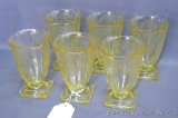 Six yellow Depression glass footed glasses, Lorraine pattern featuring floral basket design, are all