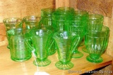 Green Depression glass. Notes found with pieces indicate patterns including 'Colony', 'Colonial