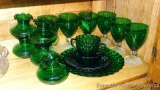 Dark green Depression and other glass pieces. Dark Green bubble pattern pieces include 9-1/4