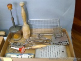 Onion and Food Chopper, bottom of jar is marked 'Lorraine Metal Mfg Co. New York. Also, mesh soap